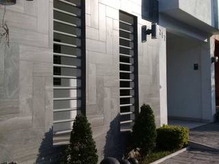 Detalle de Muro Principal R+U Arquitectos Single family home Ceramic