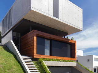 Casa de hormigón y madera, Alejandro Ortiz Arquitecto Alejandro Ortiz Arquitecto 被動式房屋 水泥