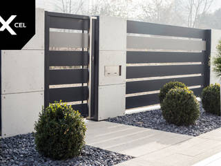 Shades of Grey. Nowoczesne ogrodzenie z betonu architektonicznego i aluminium, XCEL Fence XCEL Fence Voortuin