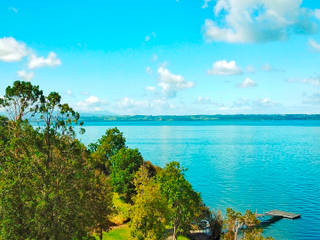 Quincho Lago Puyehue, BUVINIC ARQUITECTURA BUVINIC ARQUITECTURA Casas unifamiliares