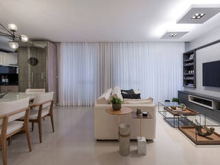 Apartamento de viajantes une praticidade e elementos contemporâneos, Espaço do Traço arquitetura Espaço do Traço arquitetura Modern living room