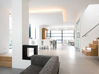 A polished concrete floor for a modern family home, Senso Senso 모던스타일 거실