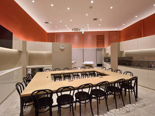 ABC Cooking Studio Nagoya Dome, KITZ.CO.LTD KITZ.CO.LTD Espacios comerciales Aluminio/Cinc Naranja