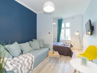Kawalerka na wynajem w Sopocie, Lux Interiors - projektowanie i aranżacja wnętrz Gdańsk, Gdynia, Sopot Lux Interiors - projektowanie i aranżacja wnętrz Gdańsk, Gdynia, Sopot Moderne Wohnzimmer