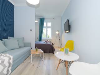 Kawalerka na wynajem w Sopocie, Lux Interiors - projektowanie i aranżacja wnętrz Gdańsk, Gdynia, Sopot Lux Interiors - projektowanie i aranżacja wnętrz Gdańsk, Gdynia, Sopot Moderne Wohnzimmer