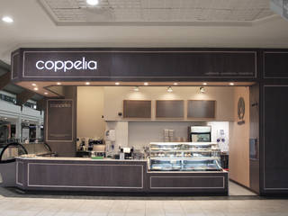 CONFITERÍA COPPELIA FLORIDA CENTER, ESTUDIOFES ARQUITECTOS ESTUDIOFES ARQUITECTOS Встроенные кухни Дерево Эффект древесины