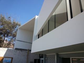 Oficinas SernamEG, Yañez y Muñoz Arquitectos Yañez y Muñoz Arquitectos Puertas y ventanas de estilo minimalista