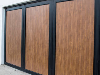 10 fachadas para tu casa con Lamitec, Lamitec SA de CV Lamitec SA de CV Wooden doors Iron/Steel