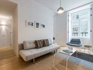 Apartment in Lisbon’s golden area, Getin - Architecture and Interior design Getin - Architecture and Interior design Ruang Keluarga Modern