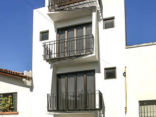Loft de la escalera espiral roja, arqflores / architect arqflores / architect Samostojna hiša