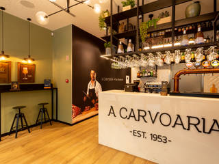 A Carvoaria - Pura Maestria, Red Centre - The Essence of Living Red Centre - The Essence of Living Commercial spaces