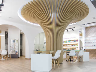 Centro óptico Nayco, estudioAMA estudioAMA ห้องทานข้าว ไม้ Wood effect