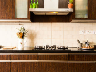Sabin sam's Apartment at Salarpuria Sattva Greenage, Mist Turnkey Interiors Mist Turnkey Interiors Rustic style kitchen