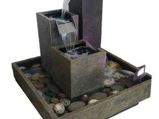 Novedosos diseños de Fuentes de agua con escalas, Creart Acabados Creart Acabados Modern garden Stone