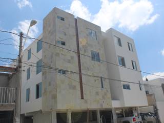 Edificio Departamentos, Xavier Laredo Arquitecto Xavier Laredo Arquitecto Spazi commerciali Cemento