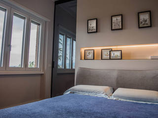 Ristrutturazione "Chiavi in Mano" camera padronale con cabina armadio, Latina, LT, A+A Architects, Arch. Antonella Ciavardini A+A Architects, Arch. Antonella Ciavardini Modern Bedroom