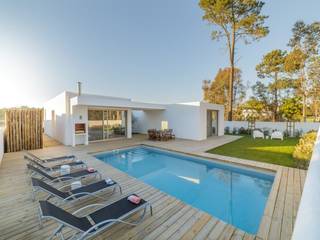 Villetta moderna in legno con piscina, Costruire Bio Costruire Bio Modern home