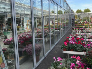 Schiebe-Dreh-System für Gartencenter in Oberösterreich von Fenster-Schmidinger, Schmidinger Wintergärten, Fenster & Verglasungen Schmidinger Wintergärten, Fenster & Verglasungen Commercial spaces Glass