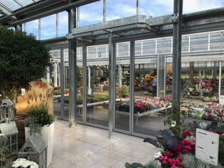 Schiebe-Dreh-System für Gartencenter in Oberösterreich von Fenster-Schmidinger, Schmidinger Wintergärten, Fenster & Verglasungen Schmidinger Wintergärten, Fenster & Verglasungen Commercial spaces Glass