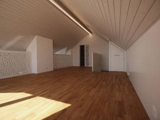 Umbau einer Dachwohnung, Ottagono+Rechsteiner Interior AG Ottagono+Rechsteiner Interior AG モダンスタイルの寝室