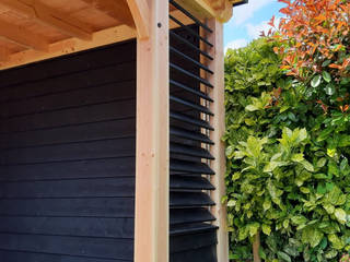 Douglas houten veranda met shutter, vlonder en buitenkachel., HAVA | Houtbouw HAVA | Houtbouw Garden Shed لکڑی Wood effect