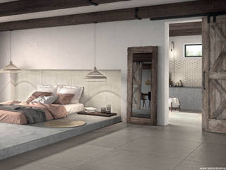 Dimensione Edilizia モダンスタイルの寝室 タイル 灰色