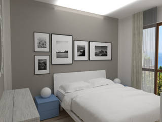 HOME RELOOKING: la trasformazione di una casa vacanza al mare, Marta Ferri Marta Ferri モダンスタイルの寝室