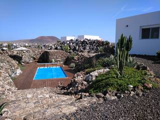 Vivienda con piscina, TZ-Arquitectura TZ-Arquitectura Jardines con piedras