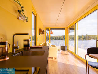 Der schwimmende Container , Container Manufaktur Berlin Container Manufaktur Berlin Minimalist dining room