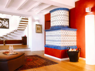 Stufe in maiolica tradizionali, Prometeo Stufe Prometeo Stufe Classic style living room Ceramic