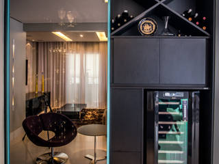 LIVING INTEGRADO COM HOME THEATER, Lucia Navajas -Arquitetura & Interiores Lucia Navajas -Arquitetura & Interiores Wine cellar