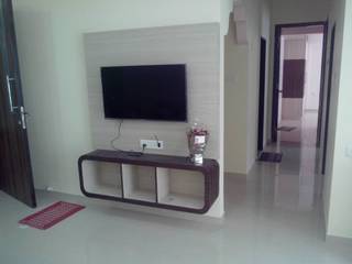 2 BHK RENOVATION WORK IN LOKHANDWALA, AXLE INTERIOR AXLE INTERIOR Salas modernas Contrachapado