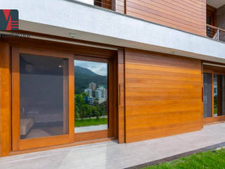 Casa de Praia Contemporânea, MEI Arquitetura e Interiores MEI Arquitetura e Interiores Single family home Solid Wood Multicolored
