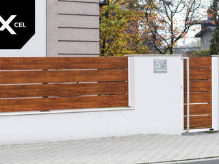 Modern Wood. Poziome ogrodzenie drewnopodobne Xcel, XCEL Fence XCEL Fence สวนหน้าบ้าน