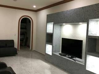 Proyecto Remodelación Family Room Antes y Despues, AR216 AR216 Salas multimedia de estilo clásico Ladrillos