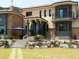 정원이 넓은 단독주택, 운화건축사사무소 운화건축사사무소 Casas de campo Concreto reforzado