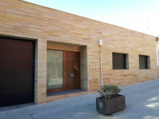 Vivienda en Sant Joan Despi, Barcelona , ARQUIDESVERN ARQUIDESVERN Minimalistische huizen Steen
