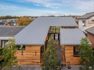 尾張旭の住宅, D.I.G Architects D.I.G Architects Casas de madeira Madeira Acabamento em madeira