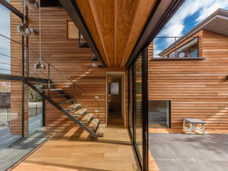 尾張旭の住宅, D.I.G Architects D.I.G Architects Casas de madeira Madeira Acabamento em madeira