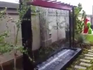 Rain curtain water feature , African Gardens Landscaping and Irrigation African Gardens Landscaping and Irrigation حديقة الخرسانة