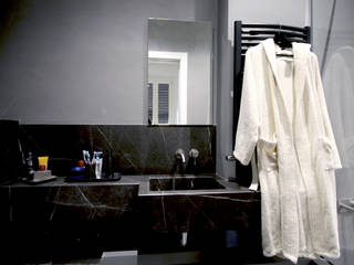 Ristrutturazione di un appartamento di 90 mq, BB1 LABORATORIO DI ARCHITETTURA & DESIGN BB1 LABORATORIO DI ARCHITETTURA & DESIGN Minimalist style bathroom