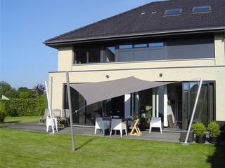 Schaduwdoek op terras, ZONZ sunsails ZONZ sunsails Moderner Balkon, Veranda & Terrasse Textil Bernstein/Gold