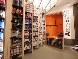 Un piccolo shop di design , ibedi laboratorio di architettura ibedi laboratorio di architettura Espaces commerciaux Béton Orange