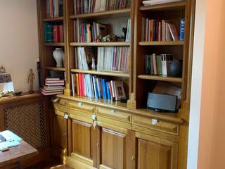 Soggiorno con librerie, Falegnameria su misura Falegnameria su misura Study/officeCupboards & shelving Wood