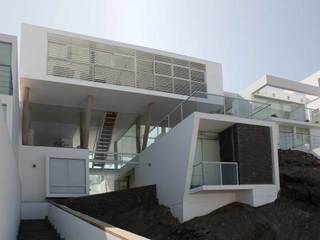 Casa de Playa en Asia, Esarquitectura Esarquitectura منزل عائلي صغير الخرسانة