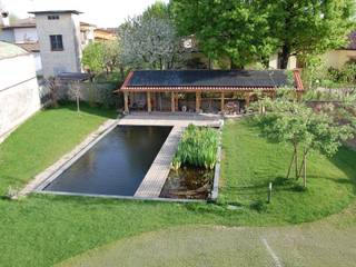 Una casa, un giardino e un lago, Andrea Treu architetto Andrea Treu architetto Schwimmteich