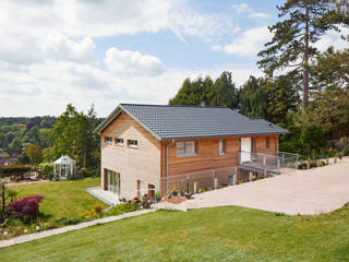 House Crowley: a Compact eco Home, Baufritz (UK) Ltd. Baufritz (UK) Ltd. Country style house