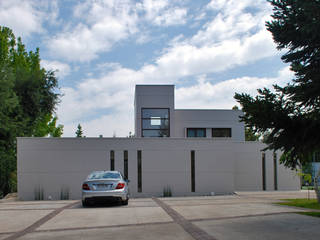 Vivienda en San Carlos de Apoquindo, Olguin Arquitectos Olguin Arquitectos Casas modernas