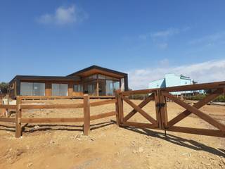 VIVIENDA, ALTO LAUQUEN , PICHILEMU, KIMCHE ARQUITECTOS KIMCHE ARQUITECTOS منزل خشبي خشب Wood effect