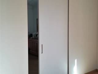 Porte da interni con sistema scorrevole a centro parete, Opendoor Italia Opendoor Italia Sliding doors